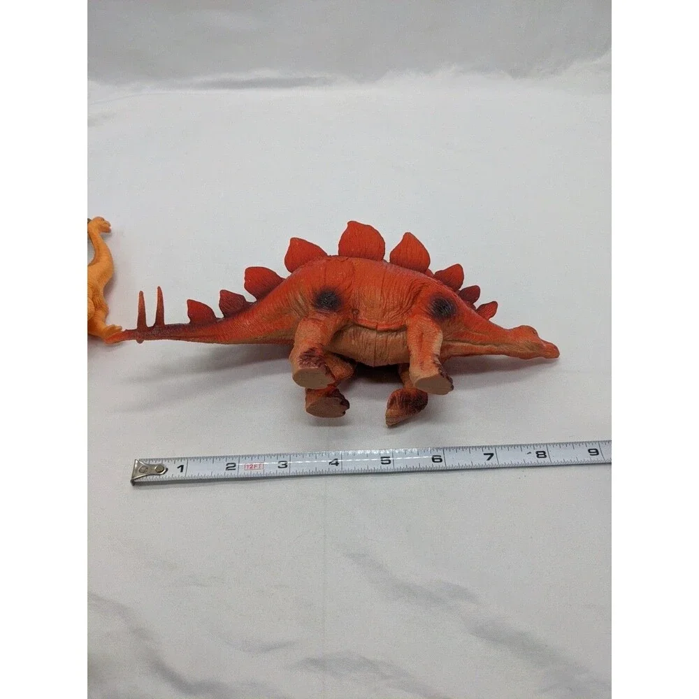 Lot Of (7) Dinosaur Toys Trex Stegasaurs Triceratops